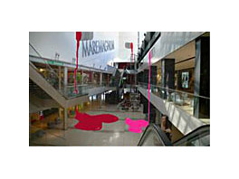 A shopping centre covered in stickers